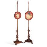 A NEAR PAIR OF VICTORIAN MAHOGANY COUNTRY HOUSE POLESCREENS