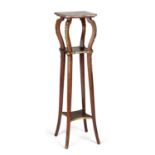 A FRENCH GILT-METAL MOUNTED, MARBLE-TOPPED AND MAHOGANY PLANTSTAND CIRCA 1900