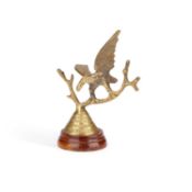 A 20TH CENTURY BRASS SCULPTURE OF AN EAGLE ON A BRANCH