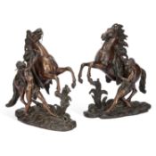 AFTER COUSTOU A PAIR OF 19TH CENTURY BRONZE HORSE MODELS OF THE 'MARLEY HORSES'