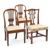 A PAIR OF GEORGE III MAHOGANY COUNTRY HEPPLEWHITE DINING CHAIRS