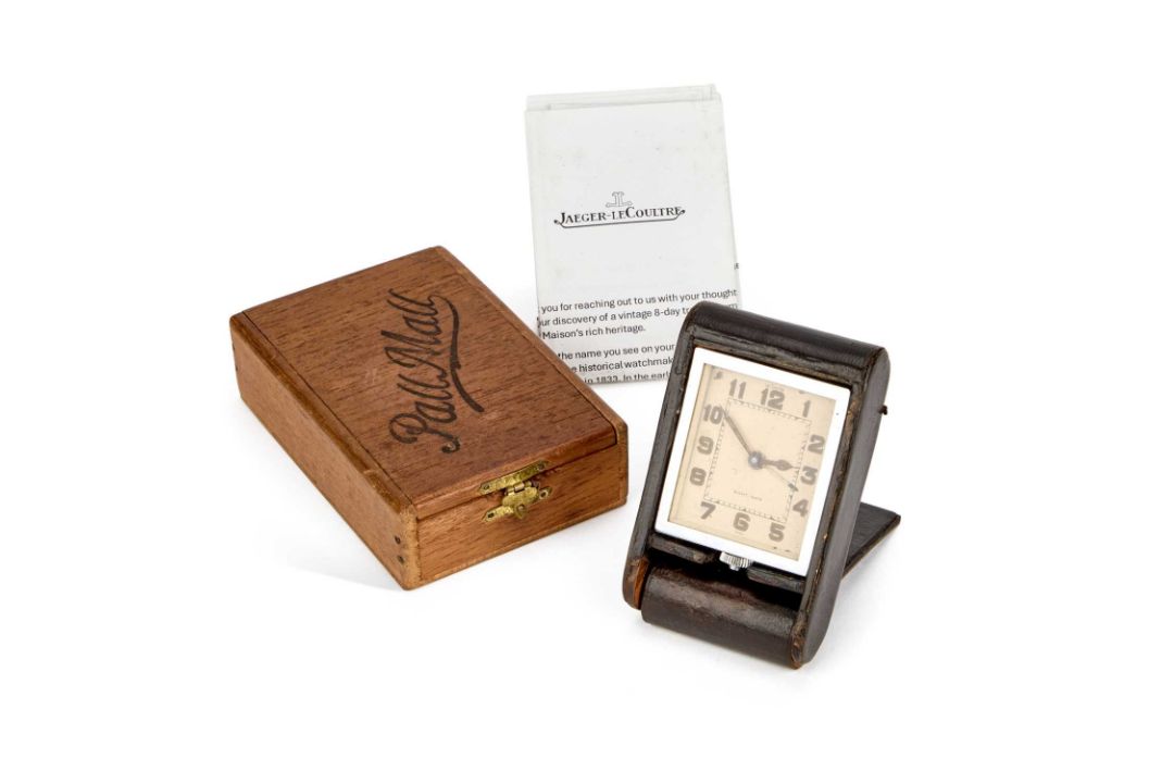 A LECOULTRE EIGHT-DAY TRAVEL CLOCK
