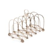 AN INDIAN COLONIAL SILVER EXPANDING TOAST RACK