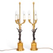 A PAIR OF BRONZE AND ORMOLU THREE-LIGHT TABLE LAMPS