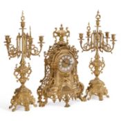 A LARGE PERIOD STYLE BRASS CLOCK GARNITURE