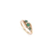 A 9 CARAT GOLD EMERALD AND DIAMOND RING