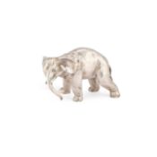 A CAST SILVER MODEL OF AN ELEPHANT