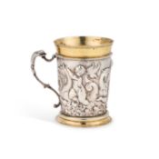 A GERMAN PARCEL-GILT SILVER MUG