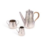 AN EDWARDIAN SILVER-PLATED THREE-PIECE COFFEE SERVICE
