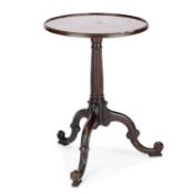 A MAHOGANY TRIPOD TABLE IN THE MANNER OF CHIPPENDALE