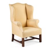 A GEORGE III STYLE MAHOGANY WING-BACK ARMCHAIR