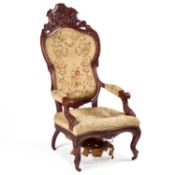 A LARGE 19TH CENTURY CARVED MAHOGANY ARMCHAIR