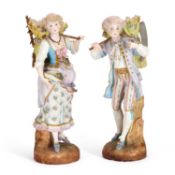 A LARGE PAIR OF GERMAN BISQUE PORCELAIN FIGURES LATE 19TH CENTURY