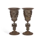 A PAIR OF LATE 19TH CENTURY CAST IRON VASES