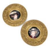 A PAIR OF CONTINENTAL BRASS-FRAMED PORCELAIN PLAQUES CIRCA 1900