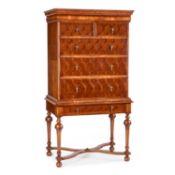 A WILLIAM AND MARY STYLE OYSTER-VENEERED WALNUT CHEST ON STAND