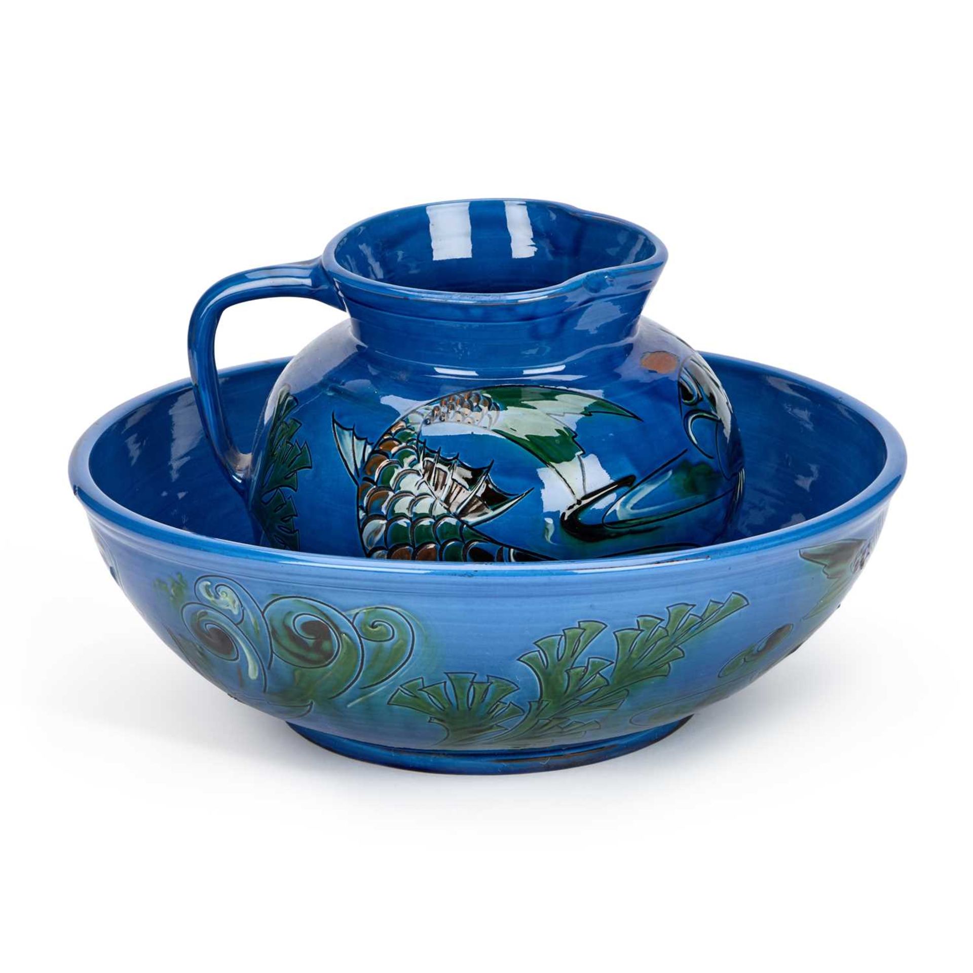 A C.H. BRANNAM POTTERY WASH BOWL AND JUG DATED 1911