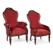 A PAIR OF VICTORIAN CARVED MAHOGANY SALON CHAIRS