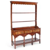 AN 18TH CENTURY OAK DRESSER AND RACK