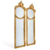 A PAIR OF PERIOD STYLE GILT FRAMED MIRRORS