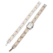 A LADY'S BROOKS & BENTLEY BRACELET WATCH AND MATCHING BRACELET