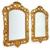 A PAIR OF FLORENTINE STYLE GILTWOOD AND GESSO MIRRORS