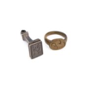 A BRONZE SIGNET RING AND A SMALL METAL SEAL