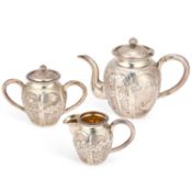 A CHINESE SILVER THREE-PIECE TEA SERVICE