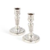 A PAIR OF 19TH CENTURY FRENCH SILVER CANDLESTICKS