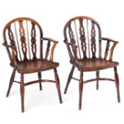 A PAIR OF 19TH CENTURY YEW WOOD AND ELM WHEEL-BACK WINDSOR CHAIRS