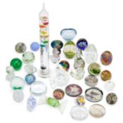 A COLLECTION OF GLASS PAPERWEIGHTS