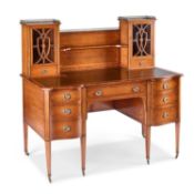 A FINE SATINWOOD AND CROSSBANDED DESK CIRCA 1890