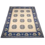A BLUE AND WHITE MACHINE-WOVEN WALL-HANGING