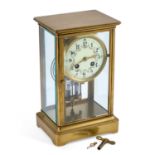 A BRASS-CASED FOUR-GLASS MANTEL CLOCK CIRCA 1900