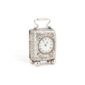 A LATE VICTORIAN SILVER CARRIAGE CLOCK