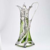 WMF (WÜRTTEMBERGISCHE METALLWARENFABRIK) AN ART NOUVEAU PEWTER AND GREEN GLASS CLARET JUG
