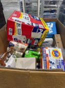 Big box in a little box store: towels, Clorox, bleach, Pine-Sol, tide pods, T-shirt, bags, premium,