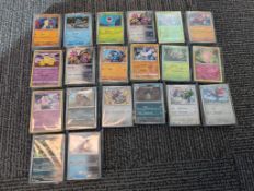 1,000 Pokemon cards (located by the auction counter)