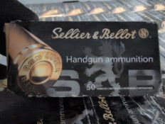 shelf of 9 mm ammunition