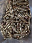 shelf of miscellaneous ammo, 12 gauge, 556, and other calibers in box