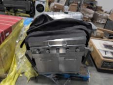 2 grills, one 5 burner very used and one 6 burner possibly new