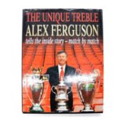 'The Unique Treble', signed by Sir Alex Ferguson