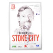 Stoke City vs Manchester United matchday programme, signed by Peter Crouch