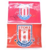 Two signed Stoke City A4 club badges