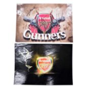 Two signed Arsenal A4 club badge, including Carl Jenkinson and others