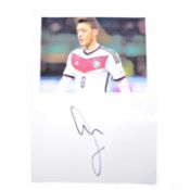 Signed Mesut Ozil A4 colour photograph, Germany