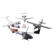 Four scale model military aircraft