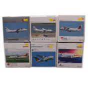 Eleven Herpa propeller model aircraft. boxed