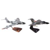 Four scale model military aircraft