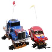 Two Tamiya RC Monster Trucks